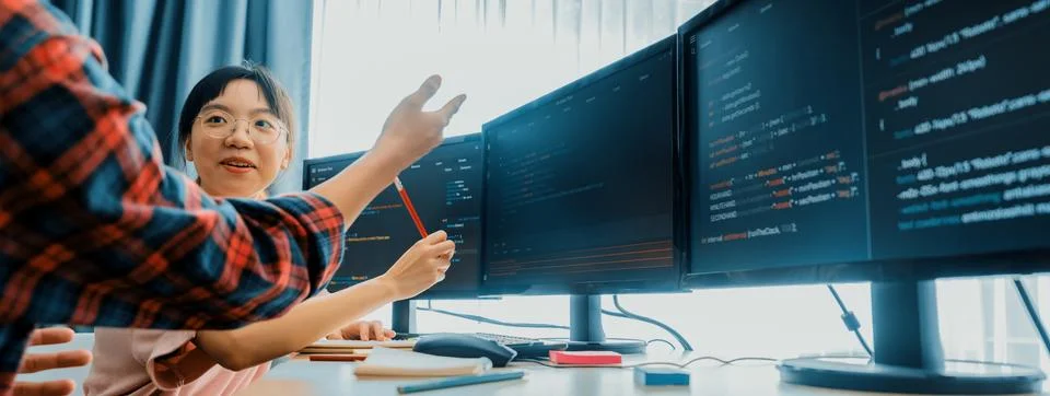 Group of professional web developer discuss about data analysis. Burgeoning. Stock Photos