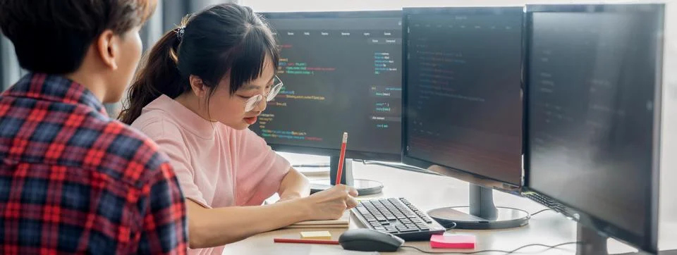 Group of professional web developer discuss about data analysis. Burgeoning. Stock Photos