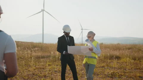 Group of professionals cooperating for producing clean eco friendly energy. Team Video stock 170589102