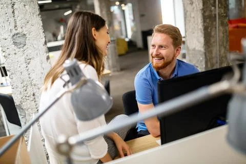 Group of programmer working in a software developing company office Stock Photos