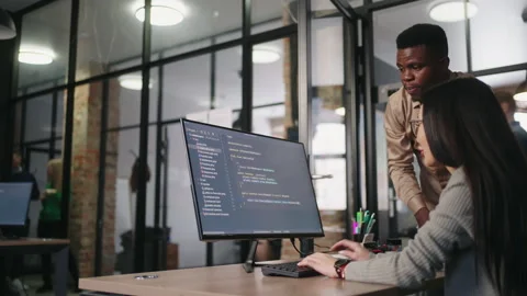 Group of Programmers Working On Big Data Processing In Office, Black Man And Video stock 236632871