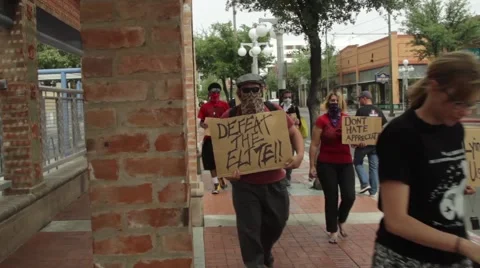 A group of protesters downtown Stock Footage 56143809
