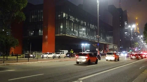 Group of protesters with flags under MASP ART Museum building, in Paulista 스톡 동영상 164817792