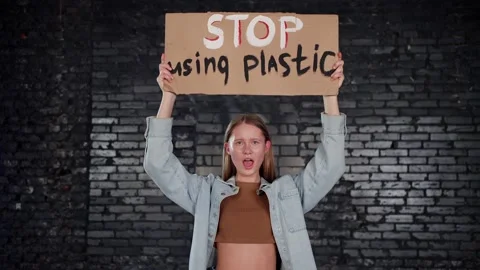 A group of protesting youth are against environmental pollution, global warming Stock Footage 233219882