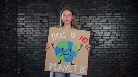 A group of protesting youth are against environmental pollution, global warming Stock Footage 233219918
