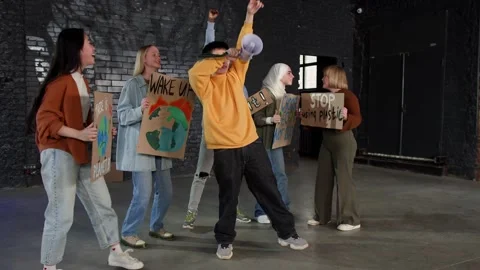 A group of protesting youth are against environmental pollution, global warming Stock Footage 233220083