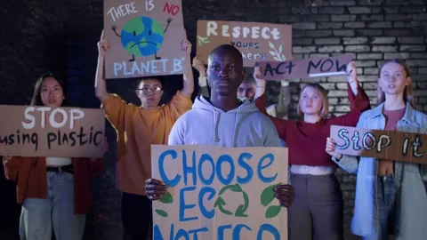 A group of protesting youth are against environmental pollution, global warming Stock Footage 233220523