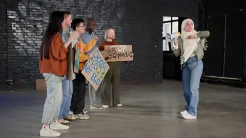A group of protesting youth are against environmental pollution, global warming Stock Footage 233220773