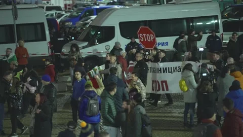 A group of protesting youth with a banner in the central square in Sofia Video stock 324555981