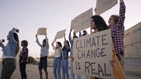 Group of Protestor Holding Posters Climate Change is Real. Activist People Stock Footage 239868495