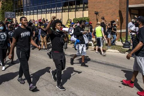Group of protestors marching Stock Photos
