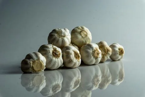 Group of raw garlic on the table Stock Photos
