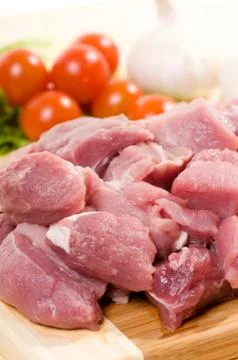 Group of raw red pork meat pieces for stew Stock Photos