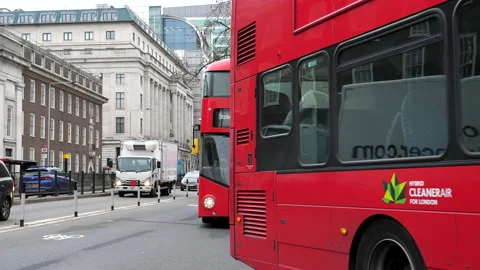Group of red buses passing camera POV Vídeo Stock 147941709
