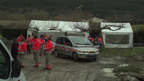 Group of red-cross agents preventing accidents Stock Footage 71718575