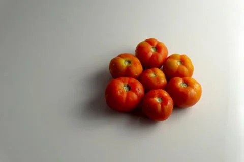 Group of red tomatoes on the table Stock Photos