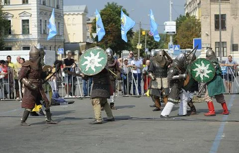 Group of reenactors dressed in armor of an Old Russian footmen reconstructing Stock Photos