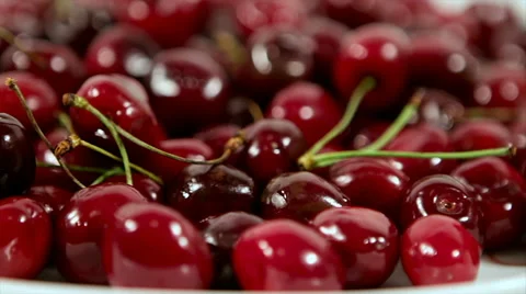 Group of ripe red cherry in a beautiful plate. Closeup. Time Lapse Stock Footage 61218198