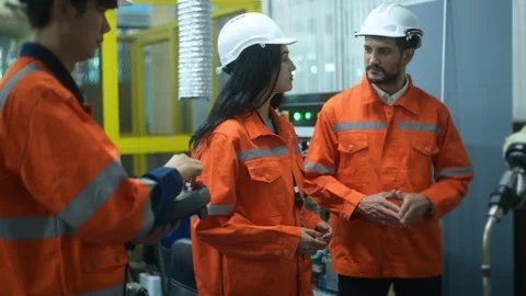 A group of Robotics engineers working with Programming and Manipulating Rob.. Video stock 280788910