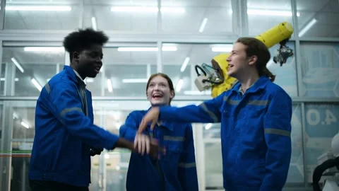 A group of Robotics engineers working with Programming and Manipulating Rob.. Stock Footage 280791399