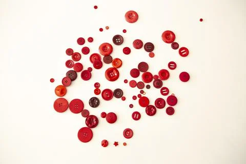 Group of round red buttons of different size and on white background Stock Photos