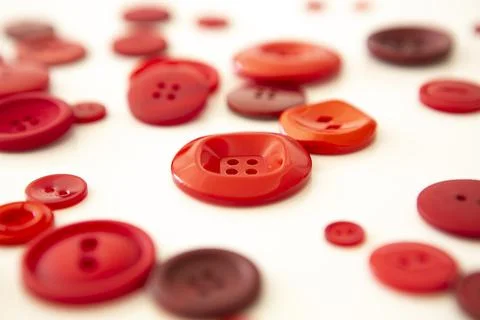 Group of round red buttons of different size and on white background Stock Photos