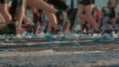 Group of runners compete in marathon or triathlon Stock-Footage 164588892
