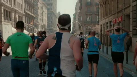 Group of runners compete in marathon or triathlon Stock Footage 167092605