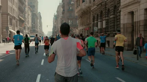 Group of runners compete in marathon or triathlon Stock Footage 170200714