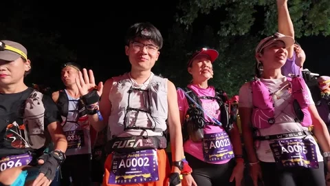 Group of Runners Facing Camera Waving Behind Start Tape, Lushan Stock Footage 346701985
