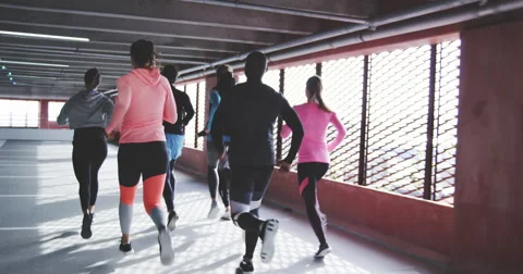 Group of runners jogging together Stock Footage 68728029