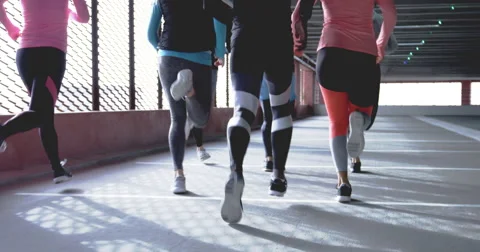 Group of runners jogging together Stock Footage 68728049
