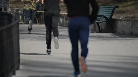 The Group of Runners Moving Away From the Camera Stock Footage 49367806