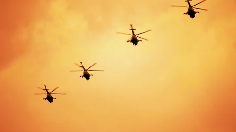 Group of russian combat helicopters, Mi-24 red warm sunset Video stock 113554183
