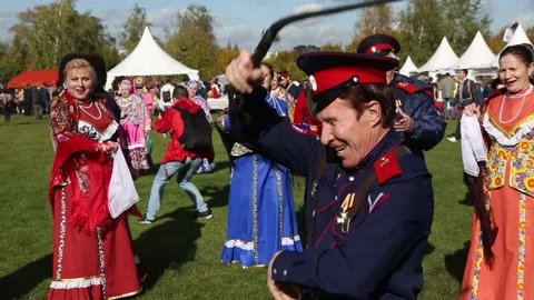 A group of Russian Cossacks dance and sing folk songs Vídeo Stock 149893759