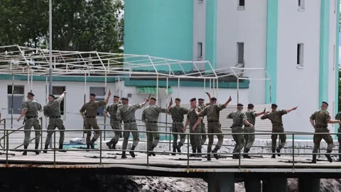A group of Russian marines is preparing for demonstration performances on the Stock Footage 203879175