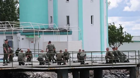 A group of Russian marines is preparing for demonstration performances on the Stock Footage 204944896