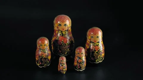 Group of Russian Nesting Dolls on a black background. 库存影片 312337840