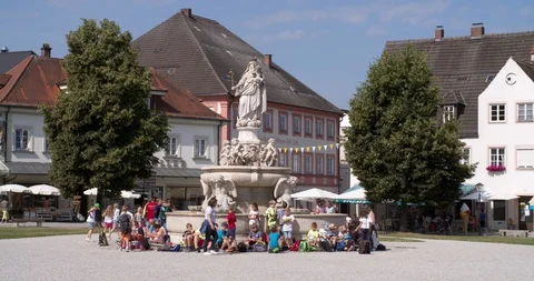 Group school children on excursion in  pilgrimage town Altötting, Germany, 4K Stock Footage 113913078