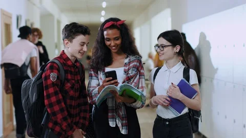Group of school friends spend time together during a break. Happy friendly Stock Footage 113625769