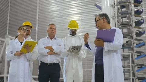 Group of scientific research engineers with students in laboratory of university Stock Footage 121101732