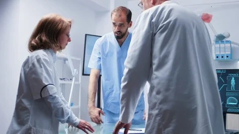 Group of scientists and an assitant are talking Stock Footage 111056875