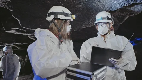 A group of scientists and cavers investigate the hidden cave of unknown humanity Vídeos de archivo 106466638