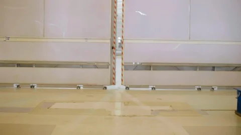 Group of scientists and engineers in white robes enter modern research Stock Footage 121869070