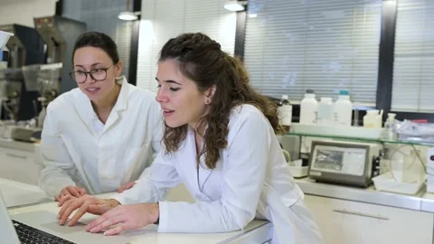 Group of scientists discussing research details in lab Video stock 147174808