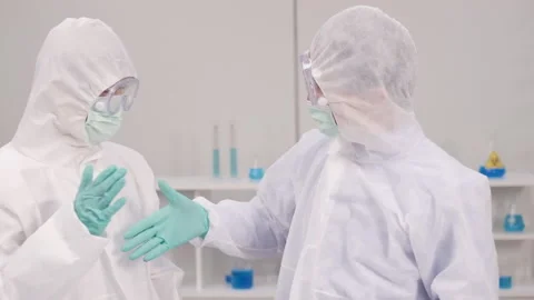 Group of Scientists with a microscope in laboratory, developing a vaccine Stock Footage 133071683