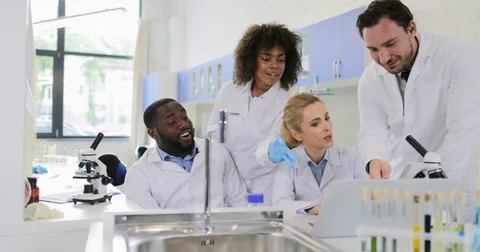 Group Of Scientists Working Together In ... | Stock Video | Pond5