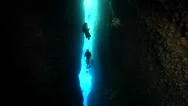 Group Of Scuba Divers Swimming In Cavern In Solomon Islands, Hd Stock Footage