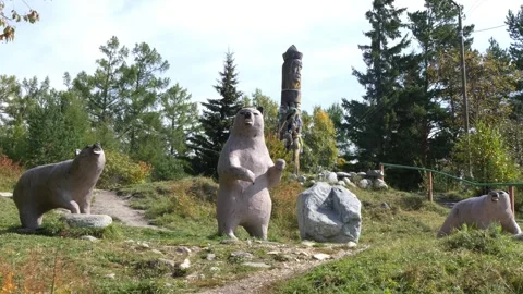 Group sculpture - Three Bears - in one of the small Buryat villages 스톡 동영상 337082224