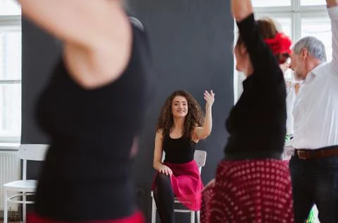 Group of senior people in dancing class with dance teacher, a midsection. Foto stock